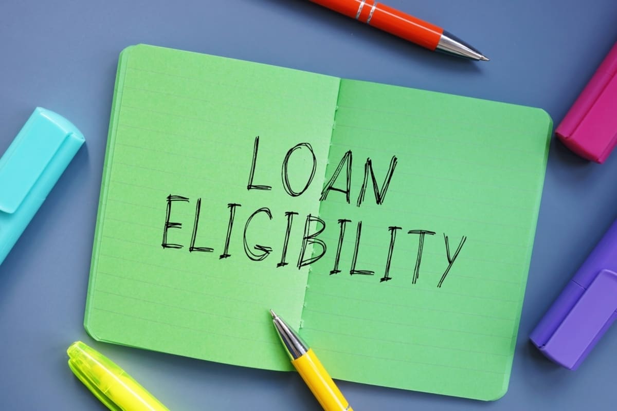 An open journal that says loan eligibility